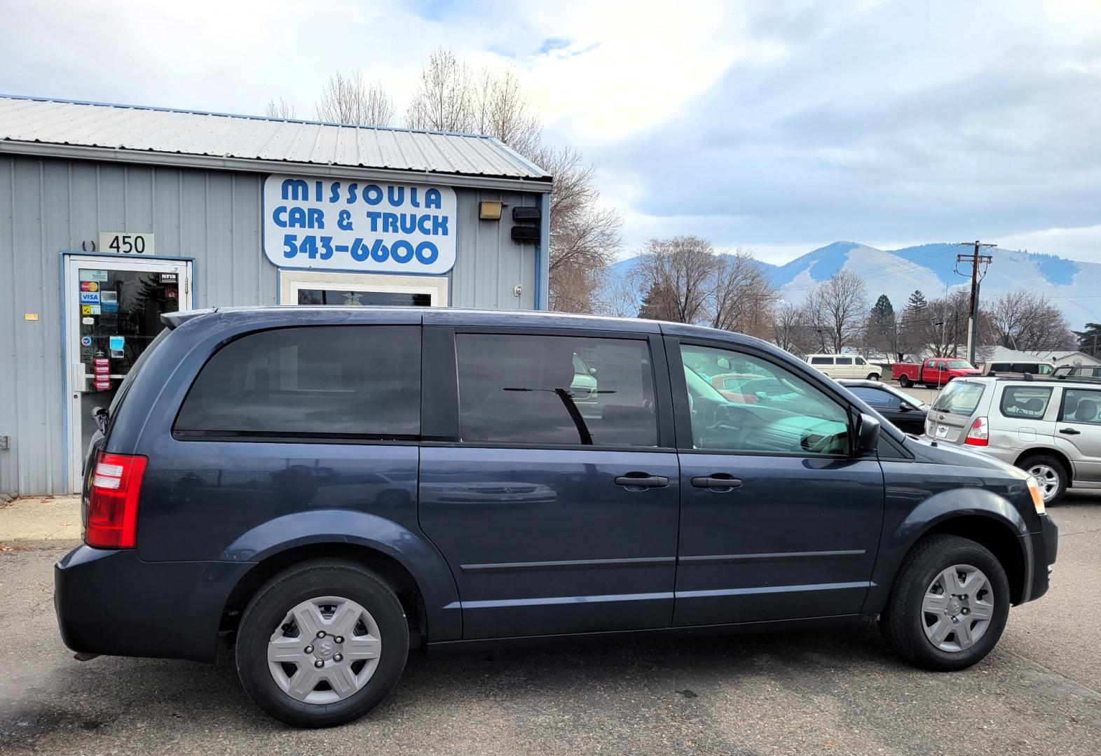 2008 Blue /Gray Dodge Caravan SE (2D8HN44H48R) with an 3.3L V6 engine, Automatic transmission, located at 450 N Russell, Missoula, MT, 59801, (406) 543-6600, 46.874496, -114.017433 - Great Running Mini Van. 3rd Row Seating. Air. Cruise. Tilt. AM FM CD Player. - Photo#0